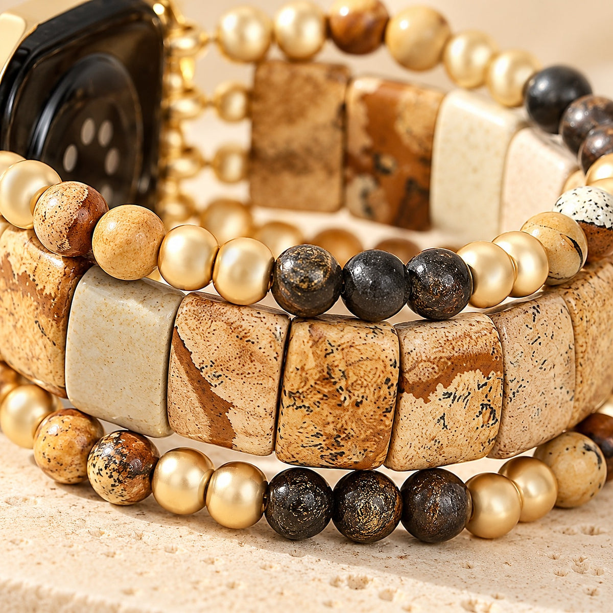 Close-up of the picture jasper stones, bronzite and gold-tone beads